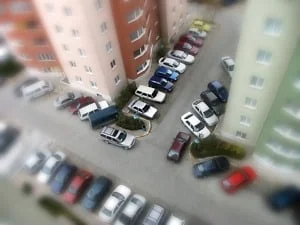 cars parked around building