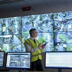 The future of parking management Security,Guard,Using,Digital,Tablet,In,Security,Control,Room,With