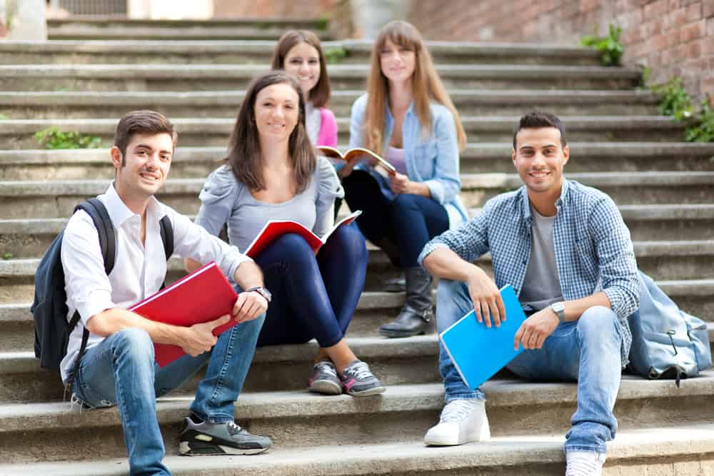 students sitting stairway
