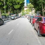 Parallel,Parking,Cars,On,Urban,Street.,Outdoor,Parking,On,Road