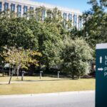 A,Hospital,Sign,Directs,Patients,And,Visitors.