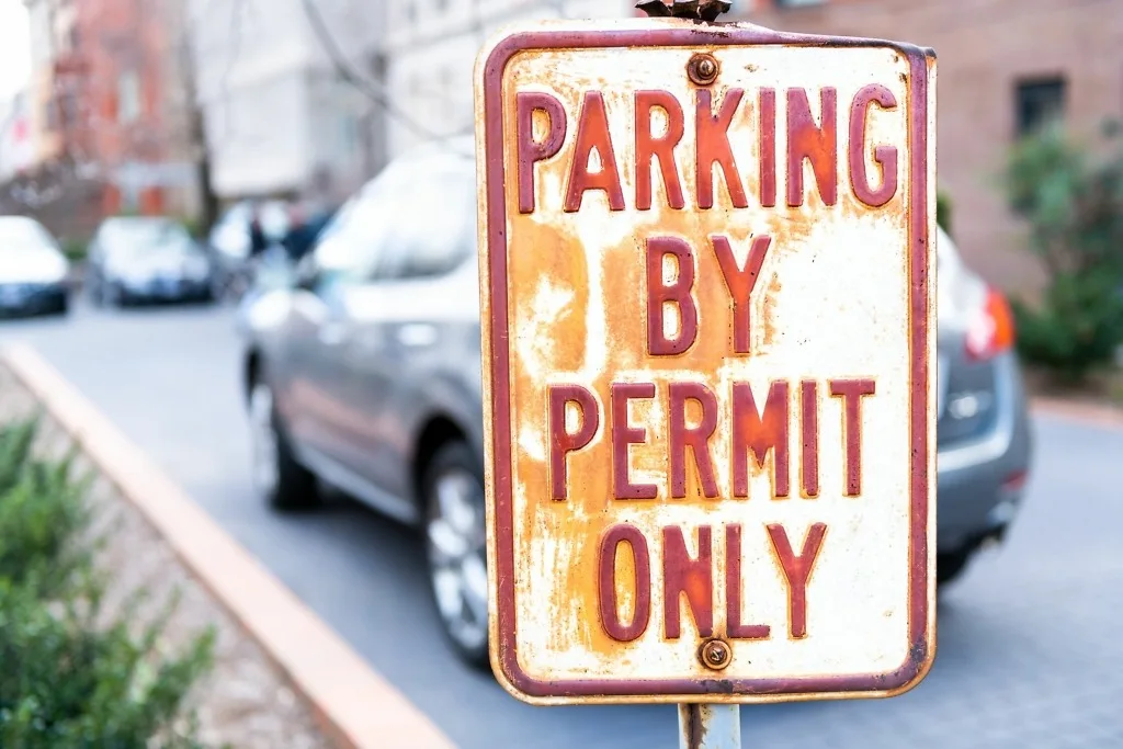 Parking by permit only sign