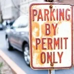 Parking by permit only sign